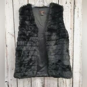 Black sleeveless fur vest. EUC